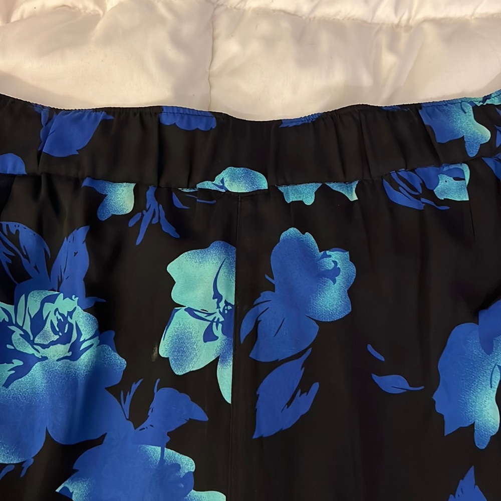 Flowy summer floral pants. Black with aqua and royal blue flowers. Size Large.